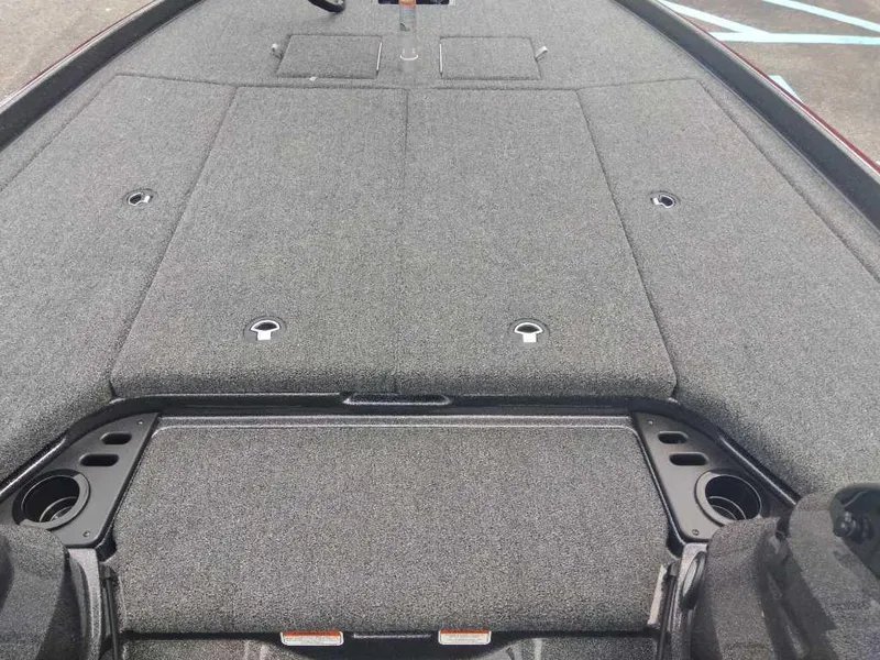 Slide: The Image of 2025 Nitro Z21 XL boat deck with storage compartments and cup holders. - 12