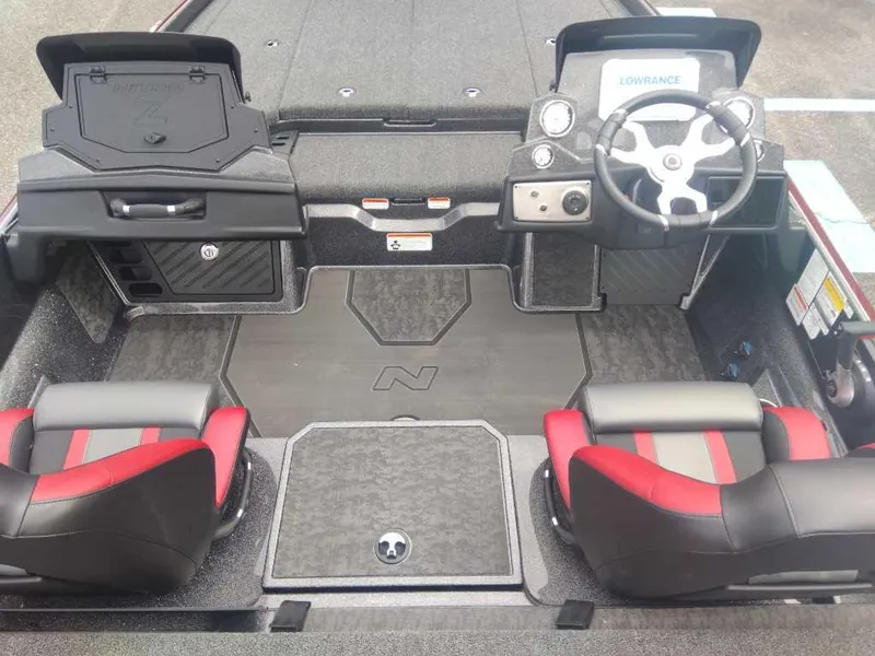 Slide: The Image of 2025 Nitro Z21 XL boat interior with dual seats and steering console. - 13