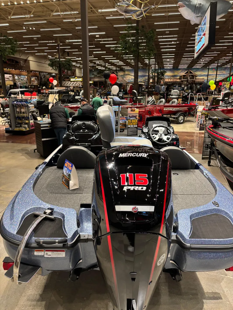 Slide: The Image of 2025 Nitro Z17 boat with Mercury 115 engine displayed in a showroom. - 3