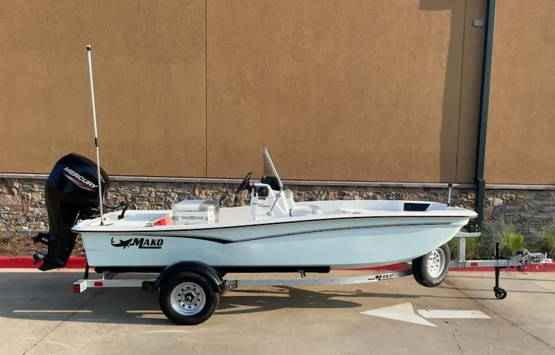 Slide: The Image of 2025 Mako Pro Skiff 15 CC boat on trailer, side view. - 4