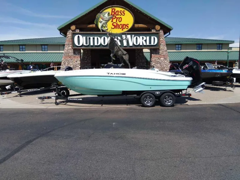 Slide: The Image of 2025 Tahoe T21 boat displayed at Bass Pro Shops Outdoor World. - 0