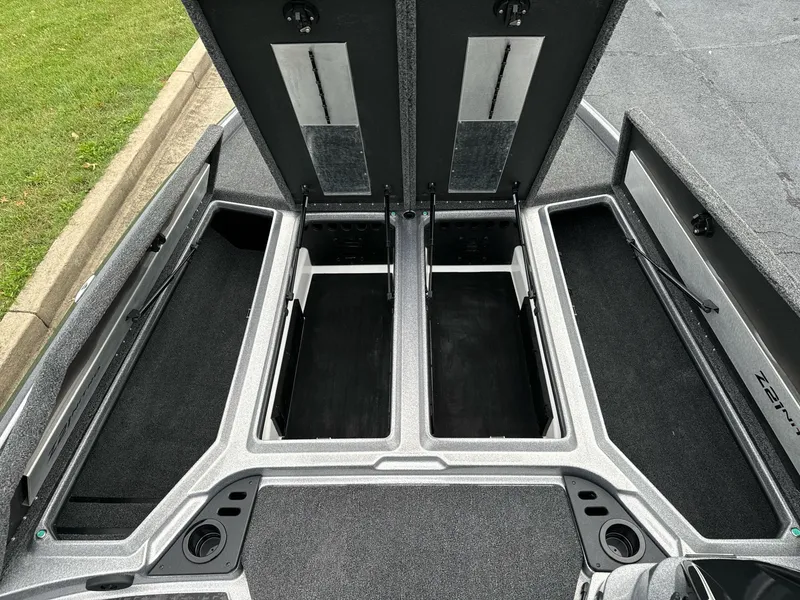 Slide: The Image of 2025 Nitro Z21 XL boat storage compartments open, showcasing spacious interior design. - 10