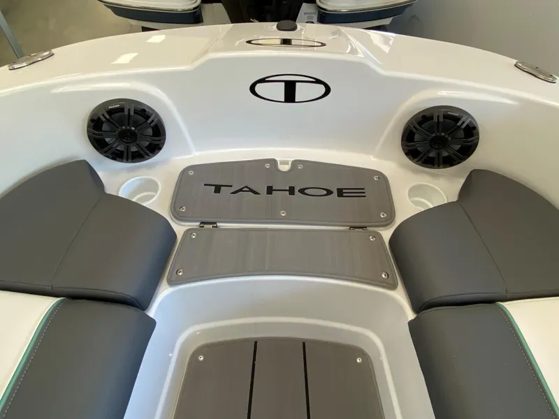Slide: The Image of 2025 Tahoe T21 boat interior with speakers and seating. - 4
