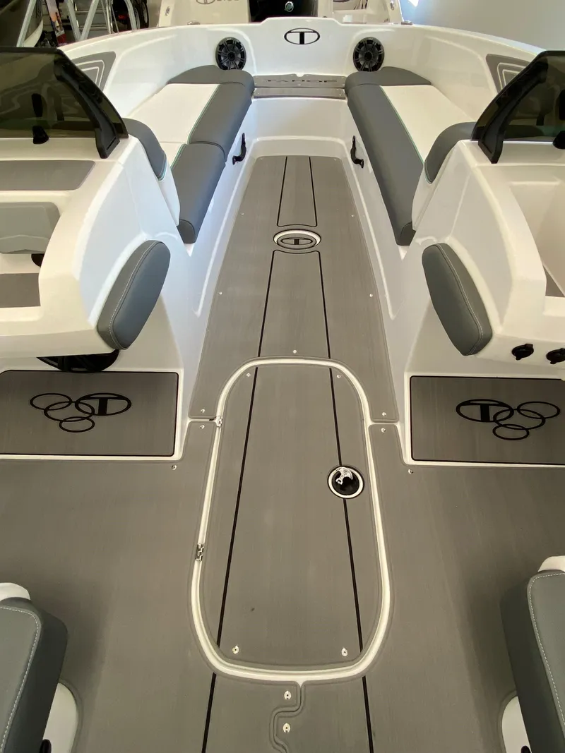 Slide: The Image of 2025 Tahoe T21 boat interior with gray seating and sleek design. - 5