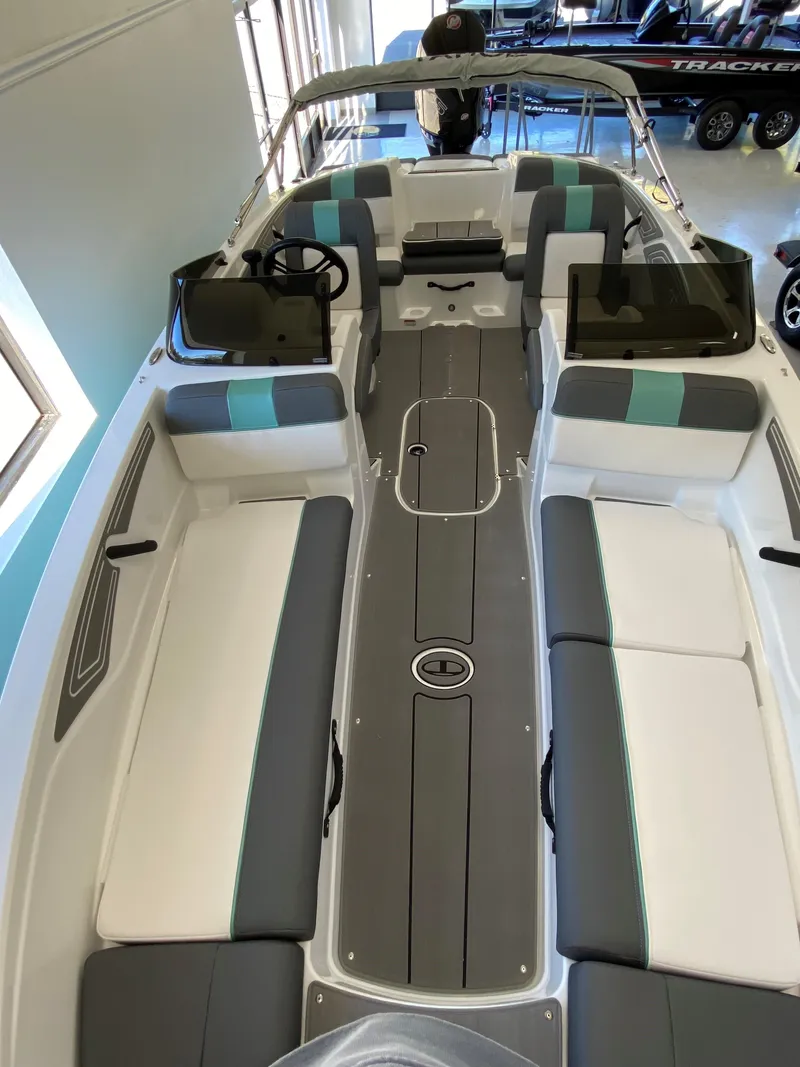 Slide: The Image of 2025 Tahoe T21 boat interior with modern seating and sleek design. - 7