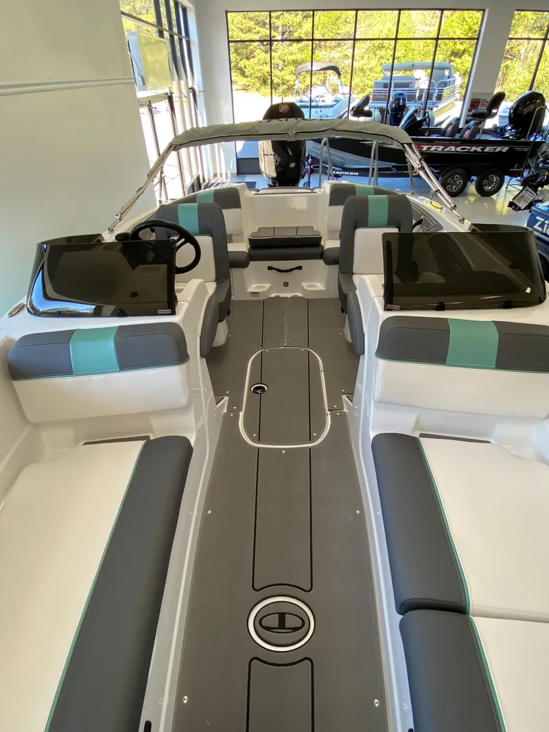 Slide: The Image of 2025 Tahoe T21 boat interior with modern seating and sleek design. - 8