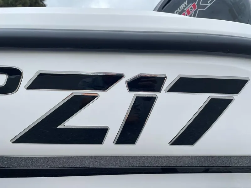 Slide: The Image of Close-up of 2025 Nitro Z17 logo on a white surface. - 2