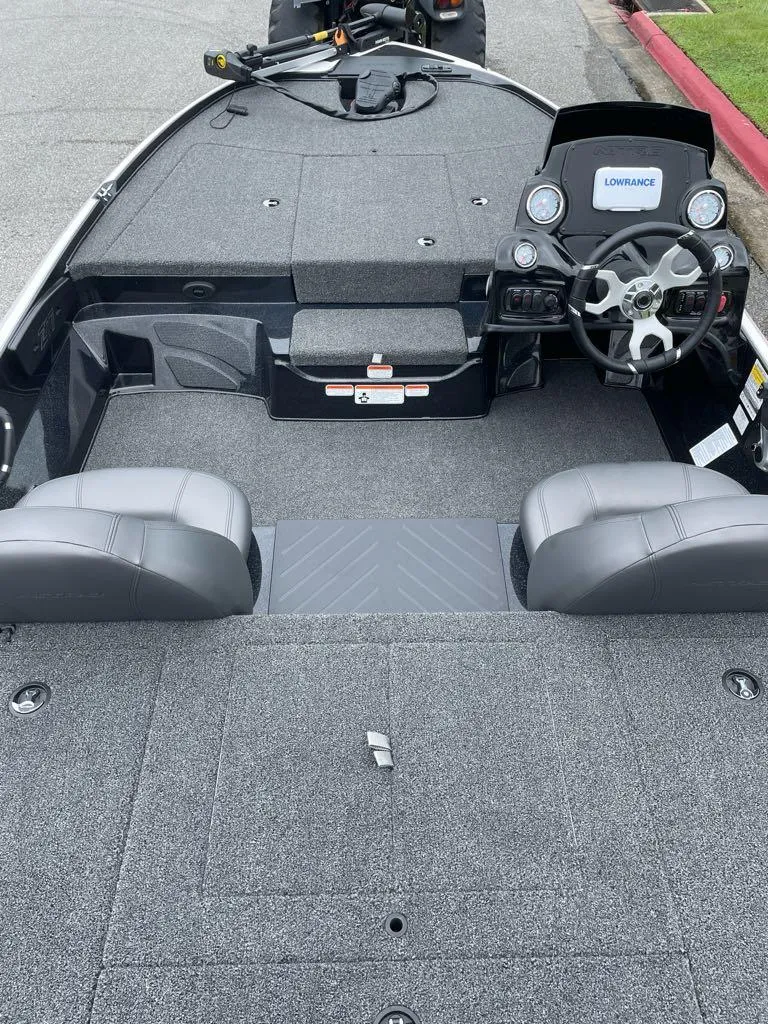 Slide: The Image of 2025 Nitro Z17 boat interior with steering wheel and seating. - 4