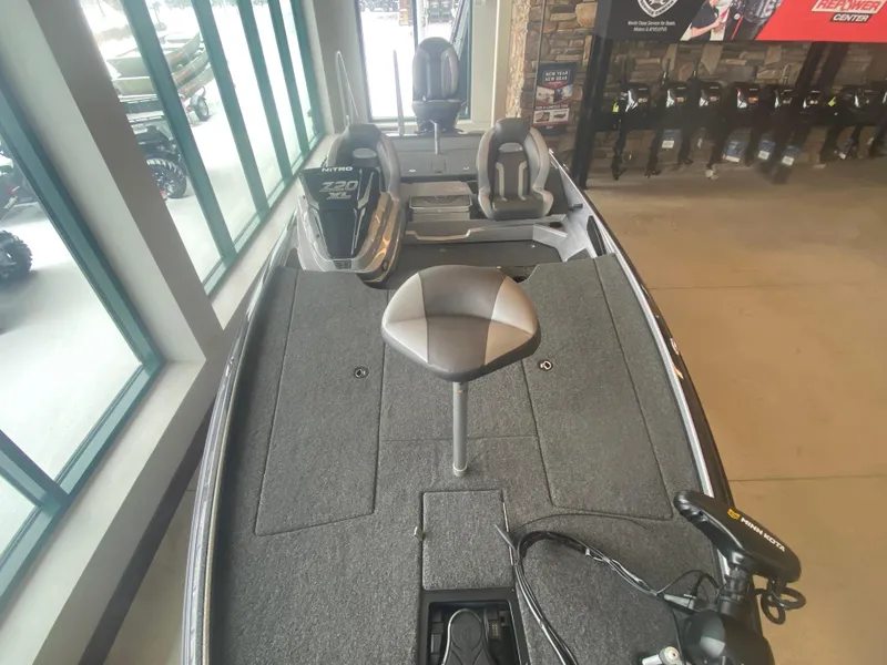 Slide: The Image of 2025 Nitro Z20 XL Pro fishing boat interior with seating and equipment. - 8