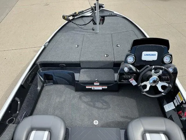 Slide: The Image of 2025 Nitro Z17 boat interior with steering wheel and seating. - 4