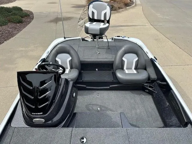 Slide: The Image of 2025 Nitro Z17 boat interior with sleek seating and modern dashboard. - 6