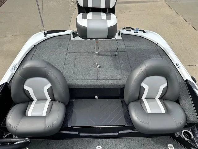Slide: The Image of 2025 Nitro Z17 boat interior with three gray and white cushioned seats. - 7