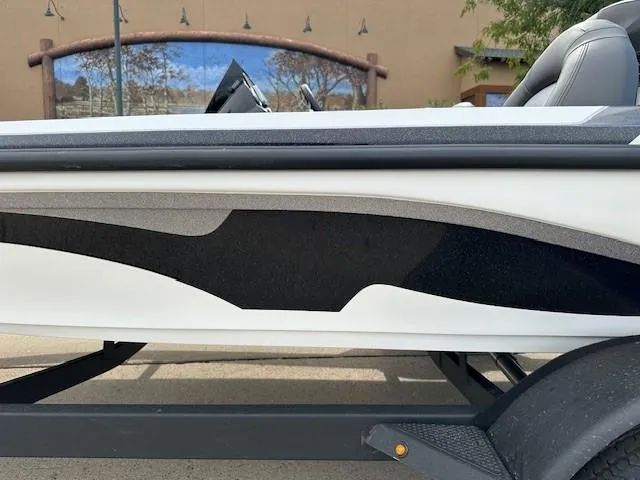 Slide: The Image of 2025 Nitro Z17 boat side view with sleek black and white design. - 8