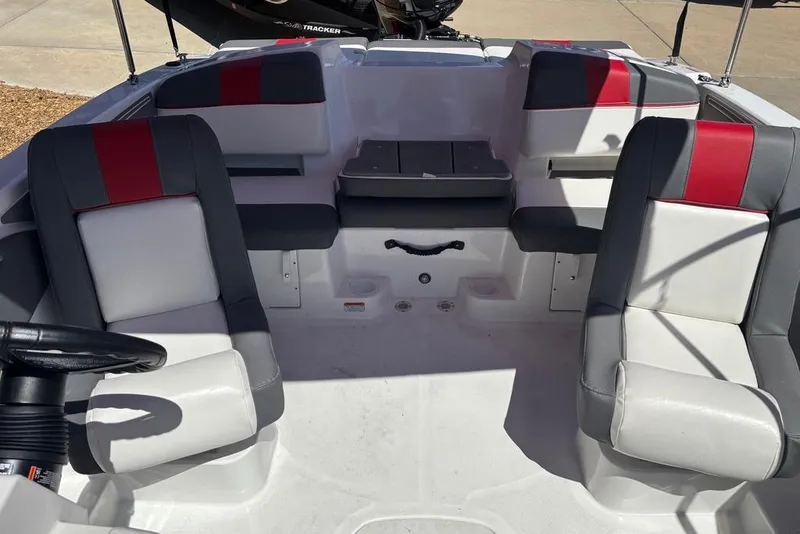 Slide: The Image of Interior of 2025 Tahoe T21 boat with gray and red seating. - 6