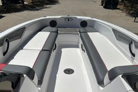 Slide: The Image of 2025 Tahoe T21 boat interior with gray and white seating, modern design. - 5