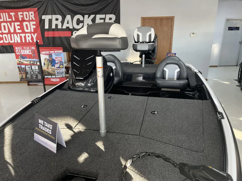 Slide: The Image of 2025 Nitro Z17 boat interior with seating and trade-in sign. - 7