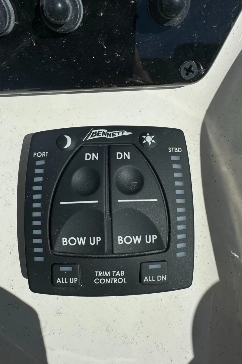 Slide: The Image of Bennett trim tab control panel on 2025 Bulls Bay 2200 boat. - 16