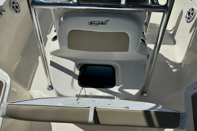 Slide: The Image of Bulls Bay 2200 boat interior, 2025 model, featuring seating and storage area. - 20