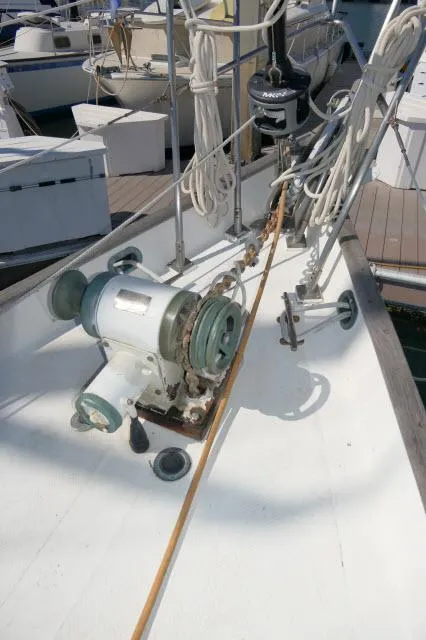 Slide: The Image of 1976 Peterson 44 sailboat deck with winch and rigging equipment. - 39