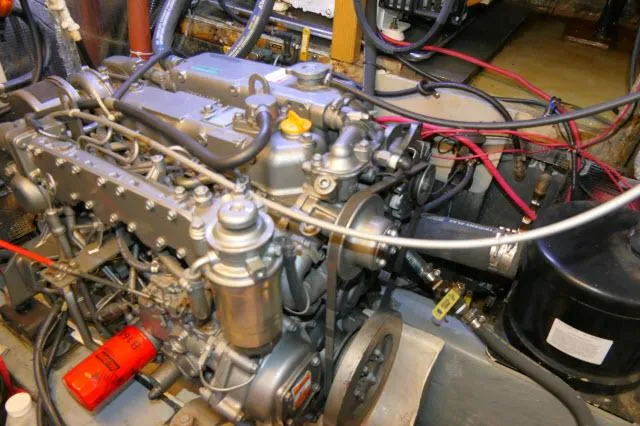 Slide: The Image of 1976 Peterson 44 engine with complex wiring and components. - 41