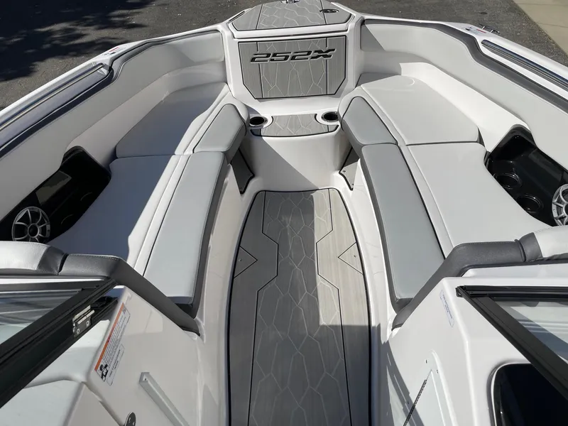 Slide: The Image of 2024 Yamaha Boats 252XE interior with sleek seating and modern design. - 10
