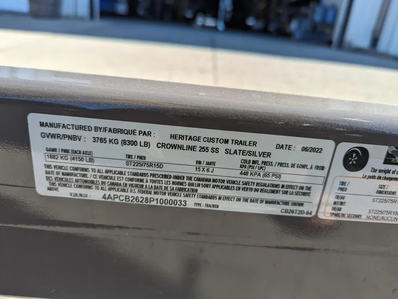 Slide: The Image of Label on 2023 Crownline 260 SS boat trailer, detailing specifications and manufacturing information. - 15