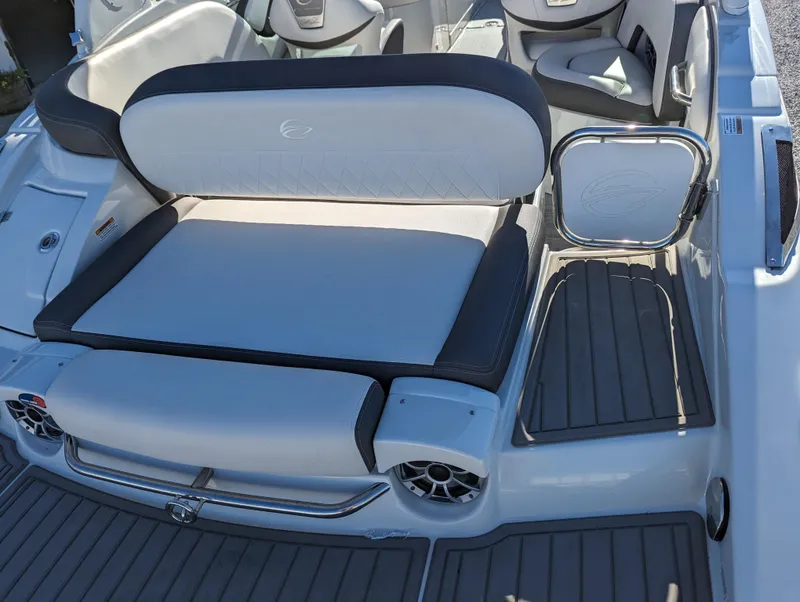 Slide: The Image of 2023 Crownline 260 SS boat interior with cushioned seating and sleek design. - 18