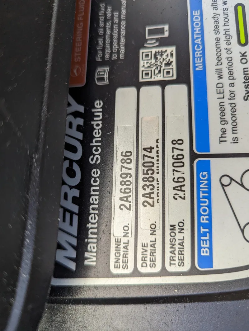 Slide: The Image of Mercury maintenance schedule label on 2023 Crownline 260 SS boat engine. - 36