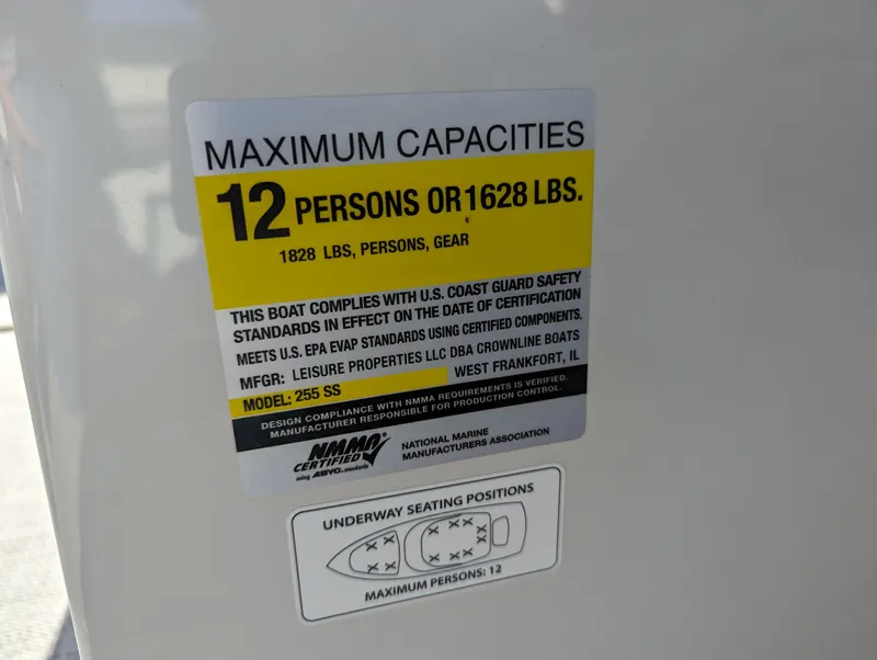 Slide: The Image of Capacity label on 2023 Crownline 260 SS boat, max 12 persons or 1628 lbs. - 40
