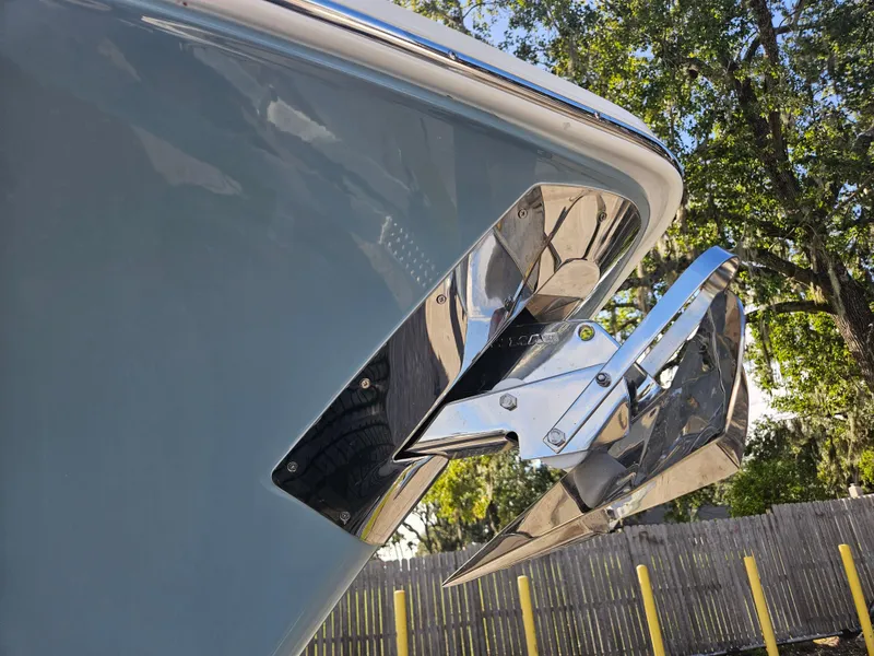 Slide: The Image of 2025 Sea Hunt Gamefish 28 CB boat anchor detail with polished metal finish. - 34