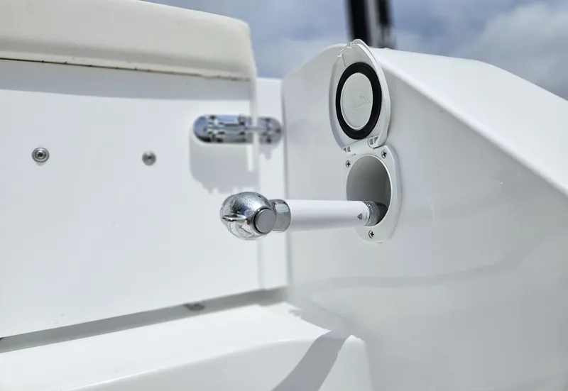 Slide: The Image of 2025 Sea Hunt Gamefish 28 CB boat detail, featuring a sleek white design and chrome accents. - 36