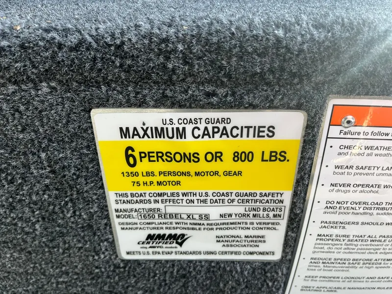 Slide: The Image of U.S. Coast Guard capacity label for 2025 Lund 1650 Rebel XL SS, 6 persons or 800 lbs. - 24