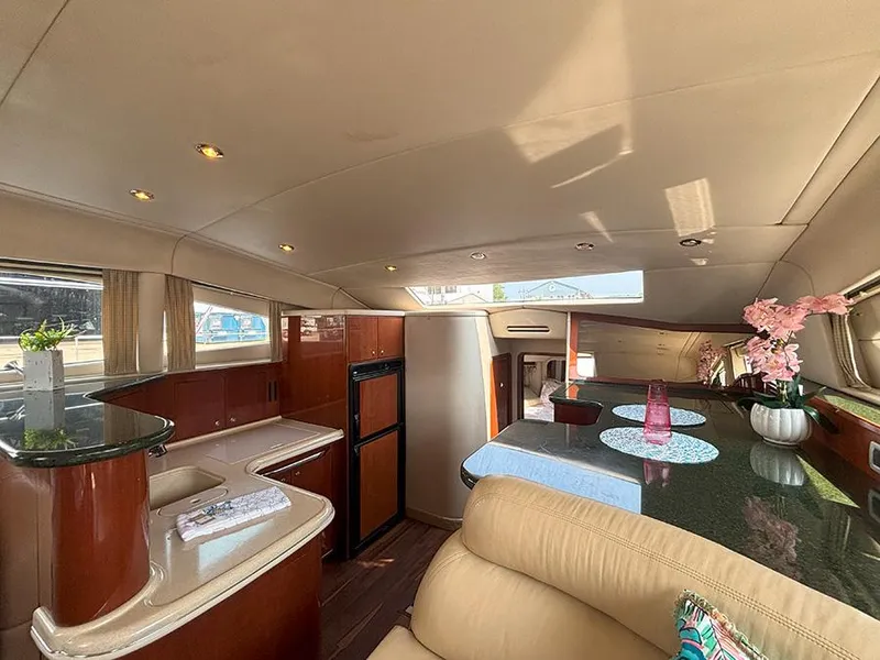 Slide: The Image of Luxurious interior of 2002 Sea Ray 480 Motor Yacht with elegant furnishings and modern amenities. - 33