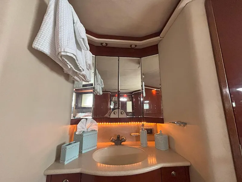 Slide: The Image of Luxurious bathroom in 2002 Sea Ray 480 Motor Yacht with elegant fixtures and ambient lighting. - 40