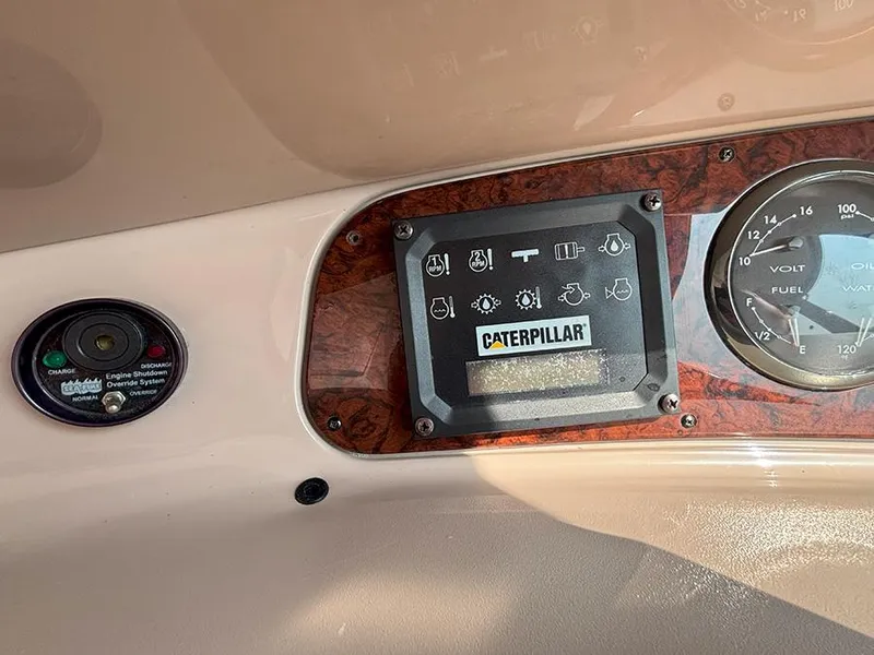 Slide: The Image of Dashboard of 2002 Sea Ray 480 Motor Yacht with Caterpillar engine display. - 49