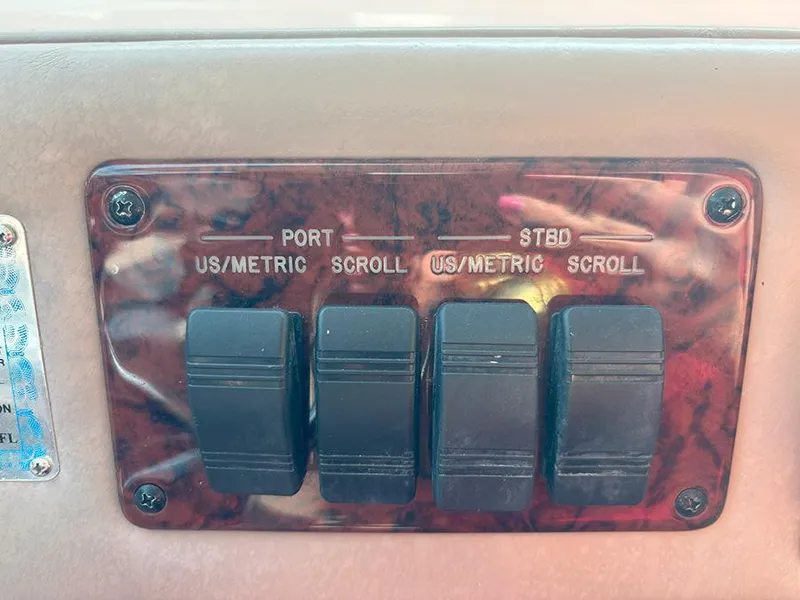 Slide: The Image of Control panel on a 2002 Sea Ray 480 Motor Yacht dashboard. - 9