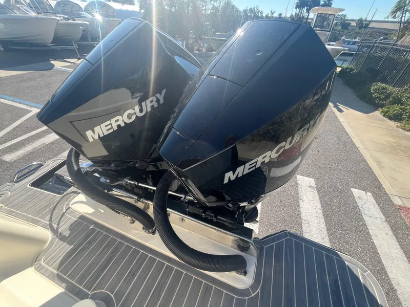 Slide: The Image of Twin Mercury engines on a 2025 Scout 277 LXF boat. - 3