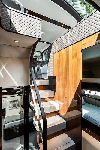 Slide: The Image of Interior of 2021 Fairline Squadron 68 yacht with modern staircase and luxurious design. - 16