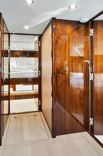 Slide: The Image of Luxurious interior of 2021 Fairline Squadron 68 yacht with polished wood finishes. - 17