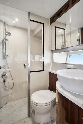 Slide: The Image of Luxurious bathroom in 2021 Fairline Squadron 68 yacht with modern fixtures and elegant design. - 23