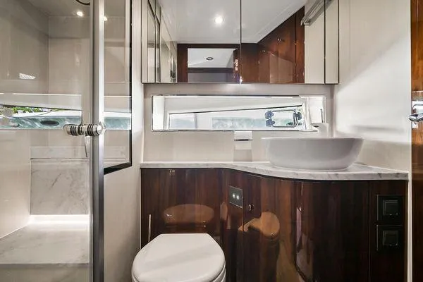 Slide: The Image of Luxurious bathroom in 2021 Fairline Squadron 68 yacht with modern fixtures and elegant design. - 24