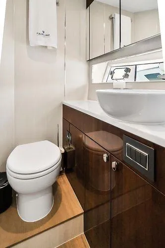 Slide: The Image of Luxurious bathroom in 2021 Fairline Squadron 68 yacht with modern fixtures and elegant design. - 26