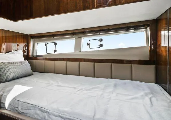 Slide: The Image of Luxurious cabin interior of 2021 Fairline Squadron 68 yacht with elegant wood finish. - 28