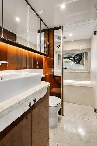 Slide: The Image of Luxurious bathroom in 2021 Fairline Squadron 68 yacht with modern fixtures and elegant design. - 31