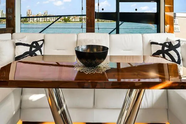 Slide: The Image of Luxurious interior of 2021 Fairline Squadron 68 yacht with elegant dining area. - 37