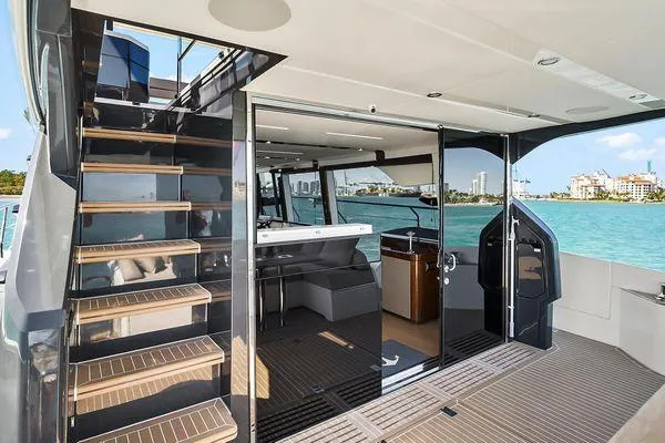 Slide: The Image of Luxury Fairline Squadron 68 yacht interior with modern design, 2021 model, overlooking serene waters. - 44