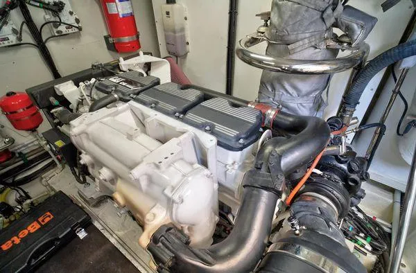 Slide: The Image of Engine room of 2021 Fairline Squadron 68 yacht, featuring advanced machinery and equipment. - 6