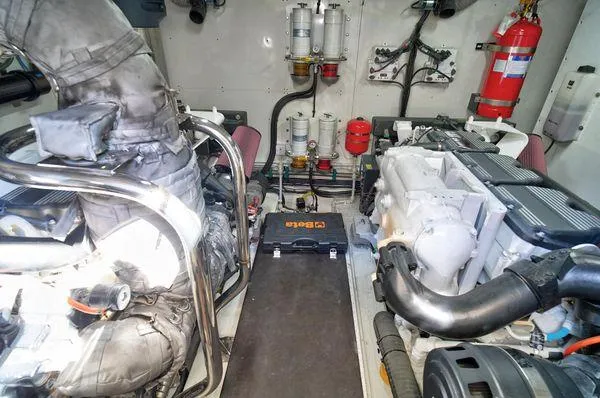 Slide: The Image of Engine room of 2021 Fairline Squadron 68 yacht, showcasing machinery and equipment. - 8