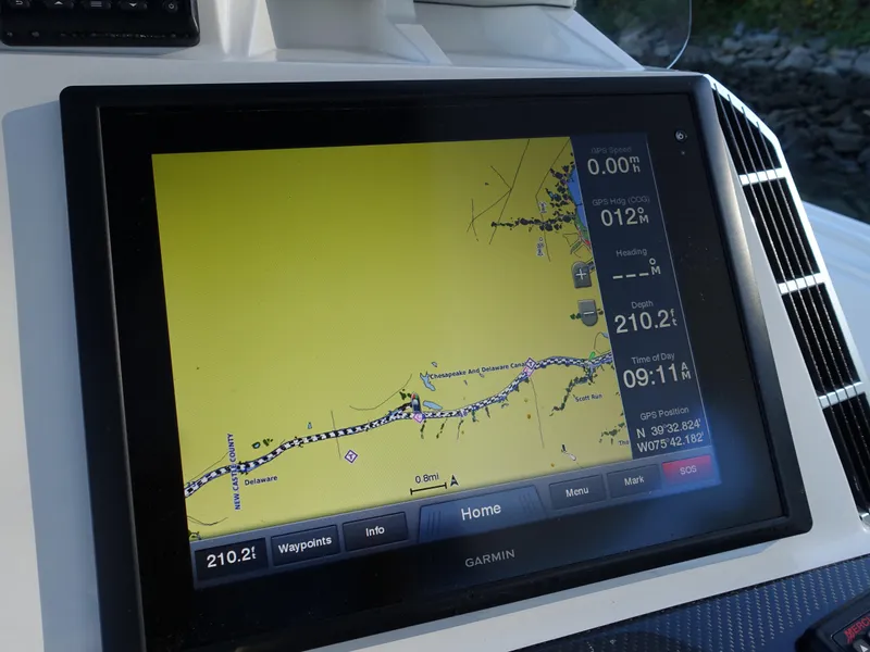 Slide: The Image of Garmin navigation display on 2014 Cigarette 42 Huntress boat, showing map and data. - 21