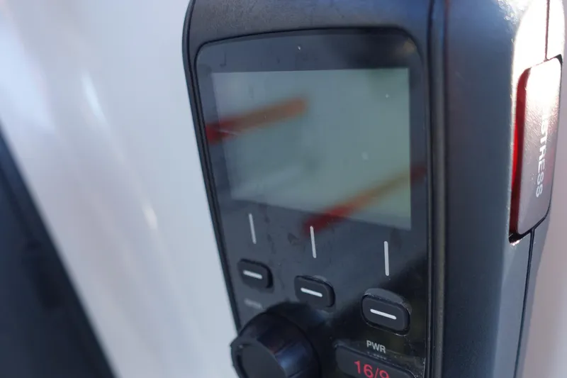 Slide: The Image of Close-up of a control panel on a 2014 Cigarette 42 Huntress boat. - 22